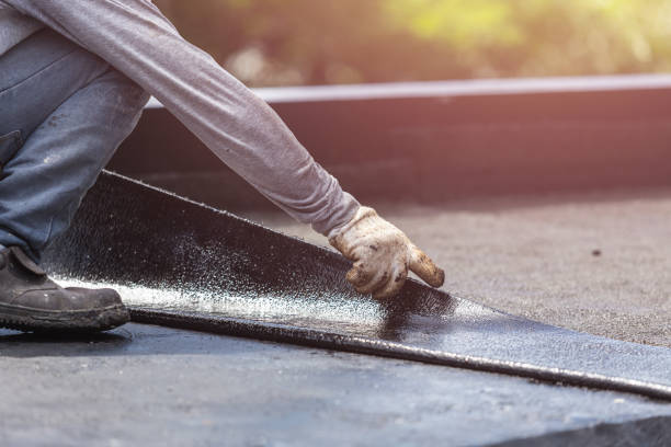 Professional Basement Waterproofing technician working in Fairland, MD